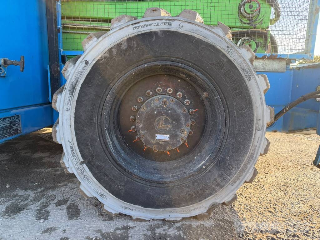 Holland Lift HL340-D30 رافعات مقصية الشكل