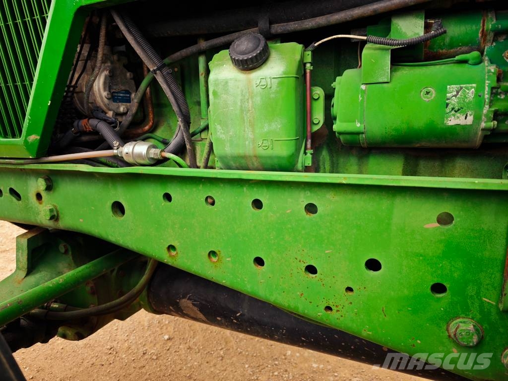 John Deere 7700 Трактора