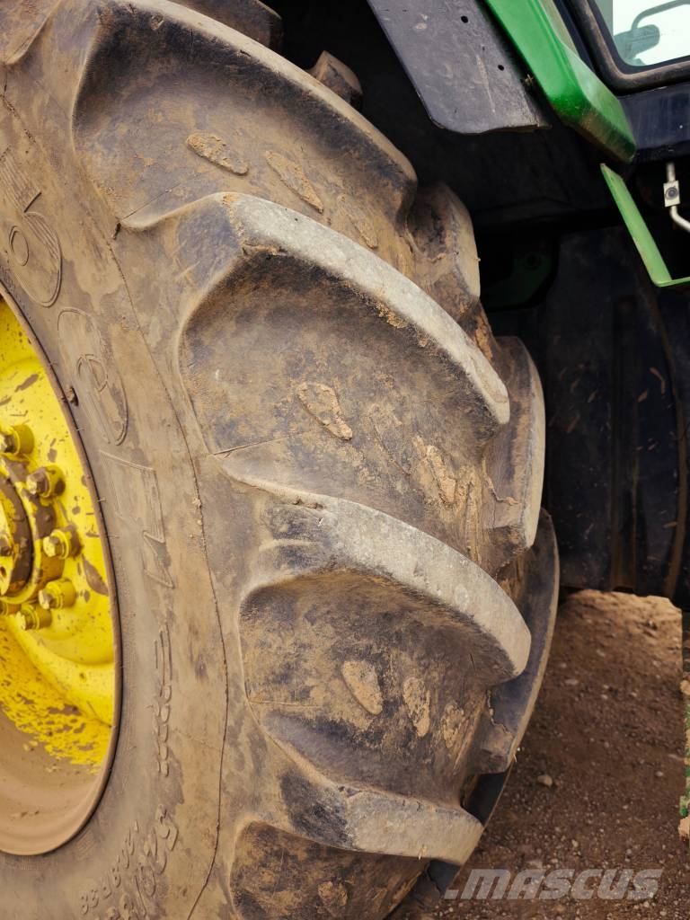 John Deere 7700 Трактора