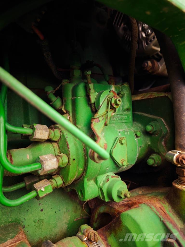 John Deere 7700 Трактора