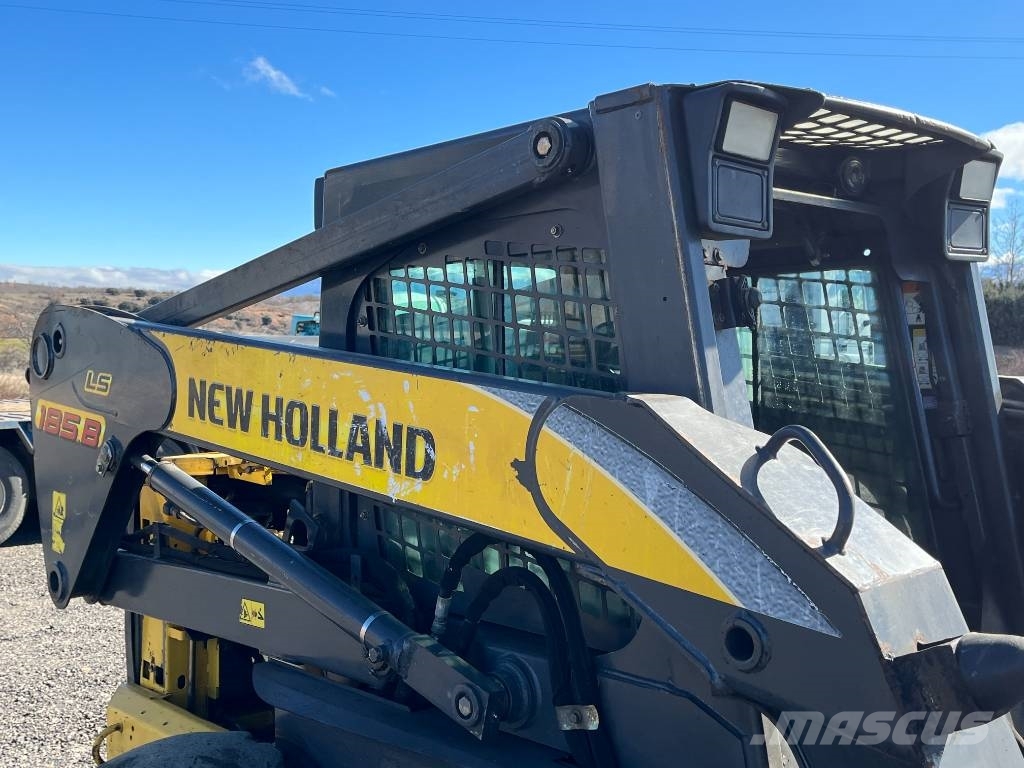 New Holland LS 185 B لوادر انزلاقية التوجيه