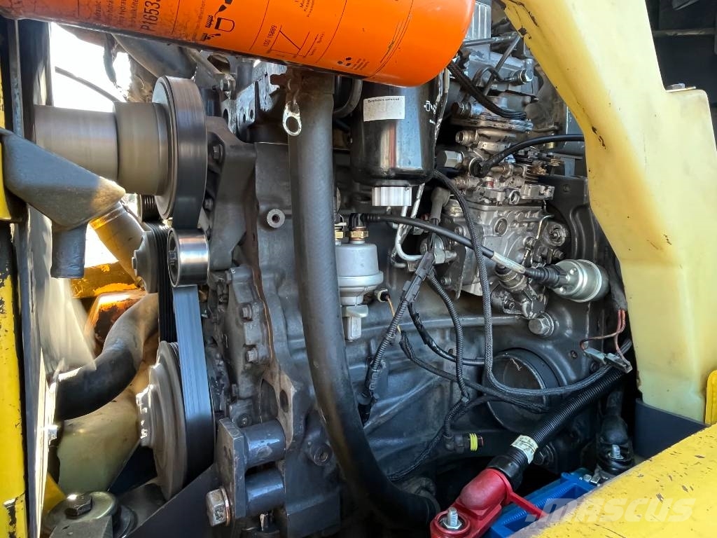 New Holland LS 185 B لوادر انزلاقية التوجيه