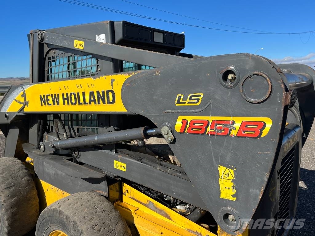 New Holland LS 185 B لوادر انزلاقية التوجيه