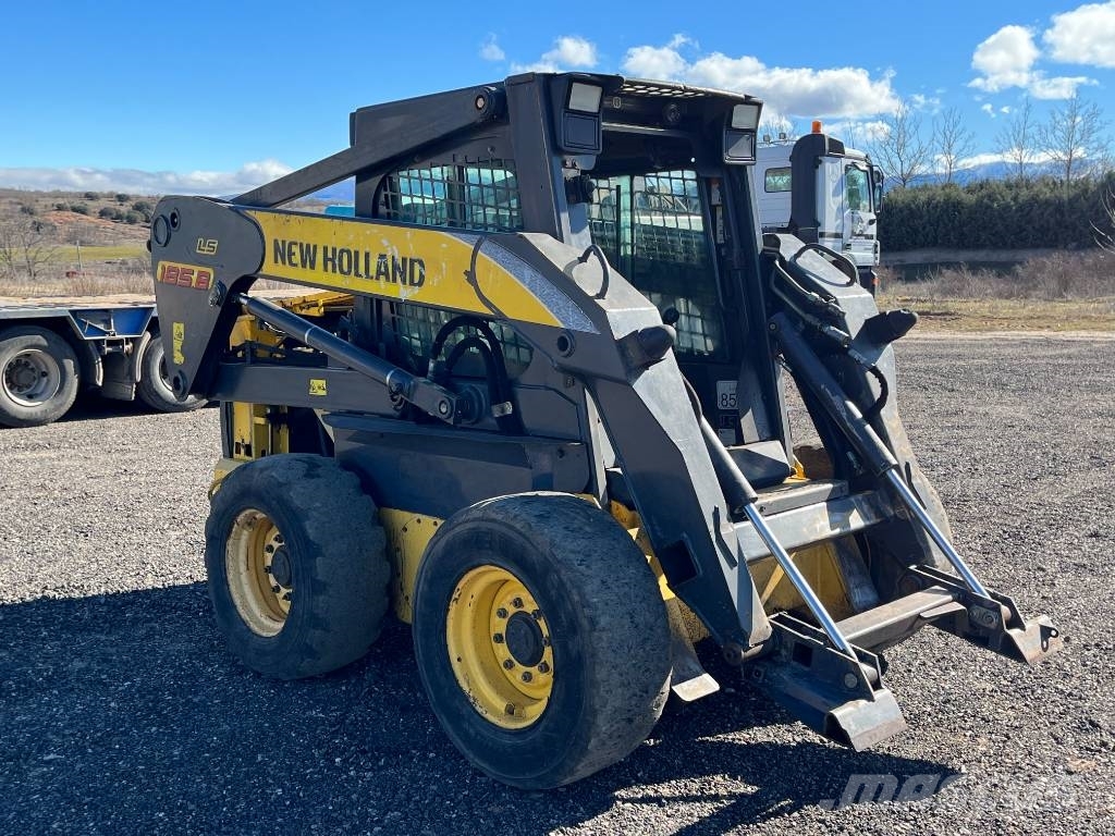 New Holland LS 185 B لوادر انزلاقية التوجيه