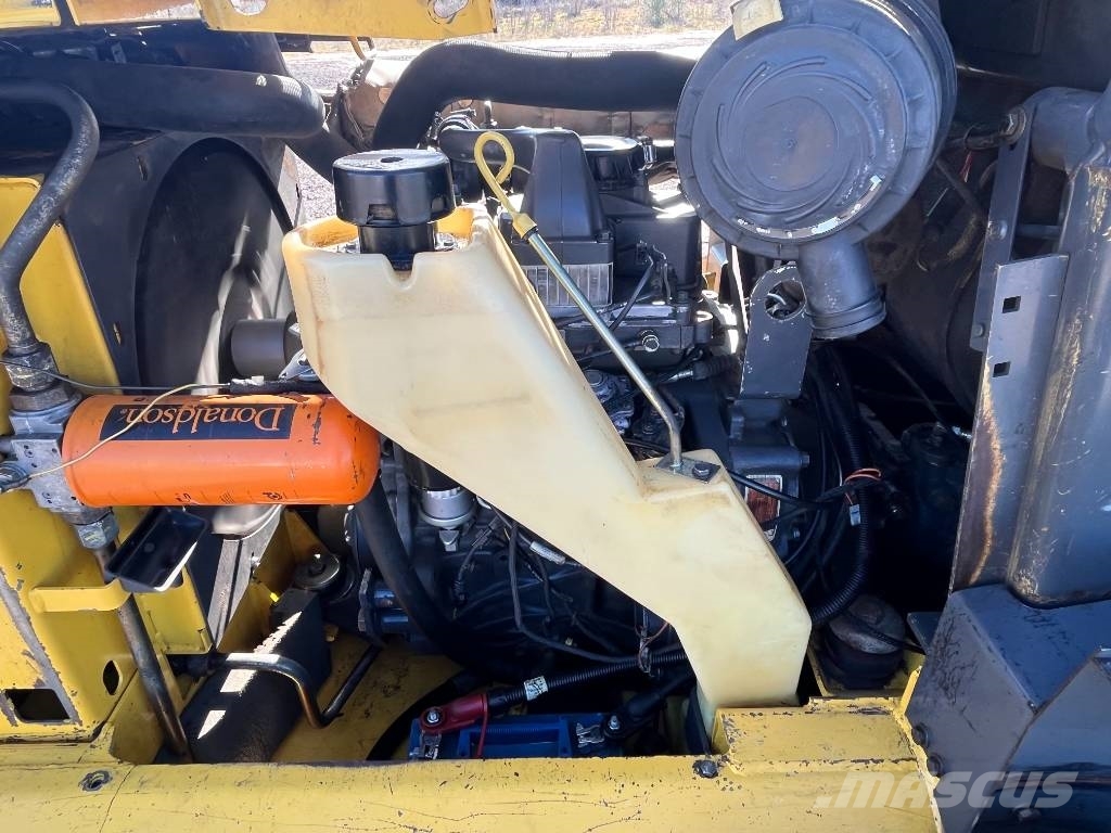 New Holland LS 185 B لوادر انزلاقية التوجيه