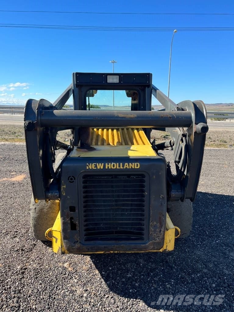 New Holland LS 185 B لوادر انزلاقية التوجيه