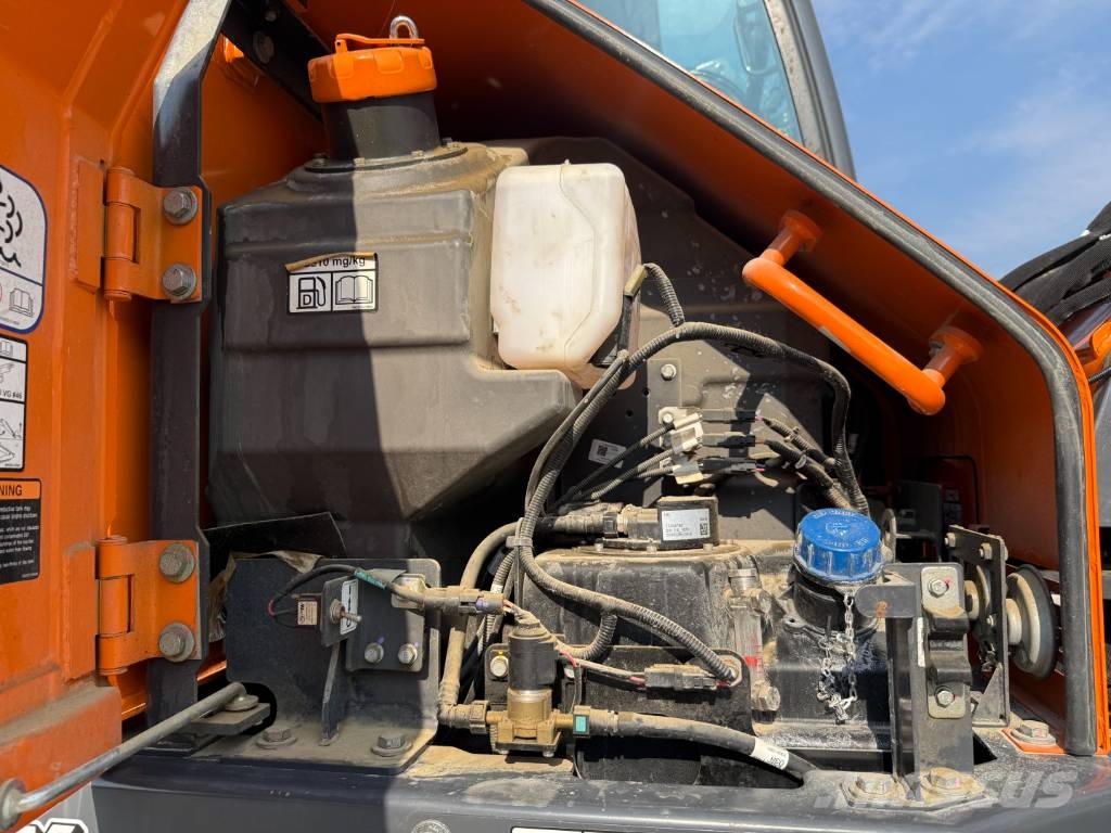 Develon DX 100 W-7 Lastik tekerli ekskavatörler
