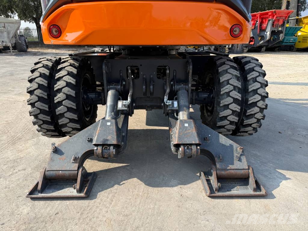 Develon DX 100 W-7 Lastik tekerli ekskavatörler