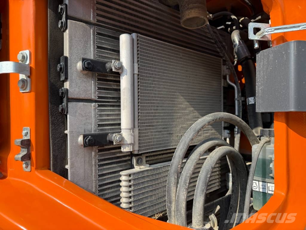 Develon DX 100 W-7 Lastik tekerli ekskavatörler