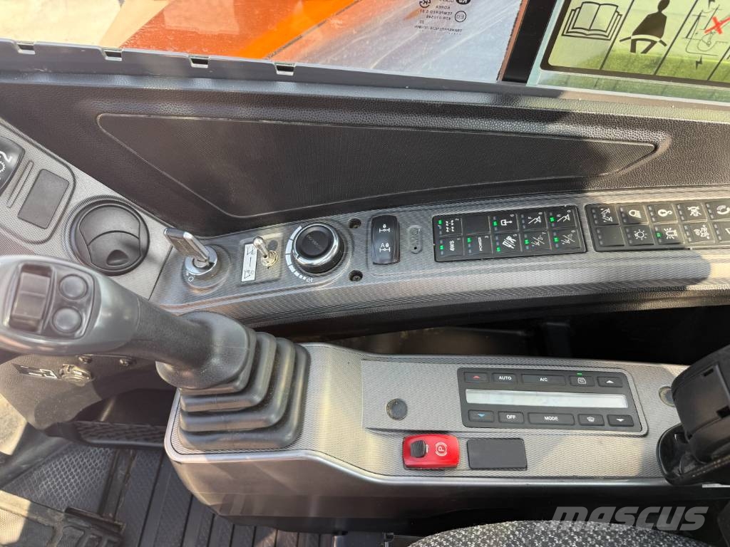Develon DX 100 W-7 Lastik tekerli ekskavatörler