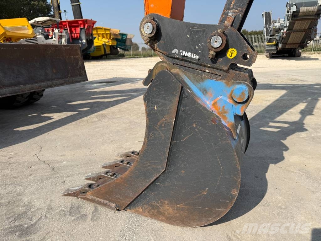 Develon DX 100 W-7 Lastik tekerli ekskavatörler