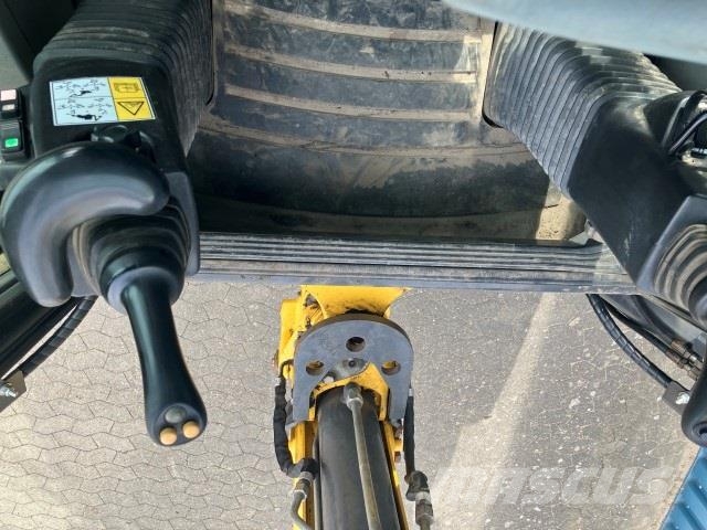 New Holland B115C CP Ekskavatoriniai krautuvai