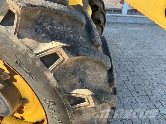 New Holland LB115 RENDEGRAVER Екскаватори-навантажувачі