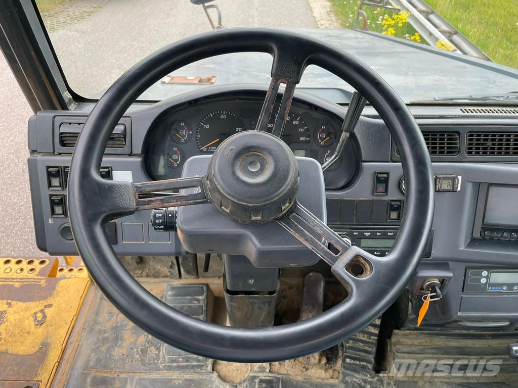 Komatsu HM300 Zglobni demperi