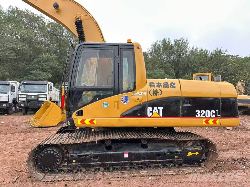 CAT 320 Pelle longue portée
