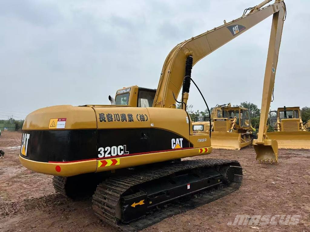 CAT 320 Pelle longue portée