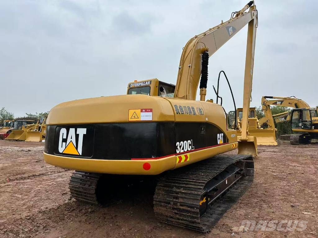 CAT 320 Pelle longue portée