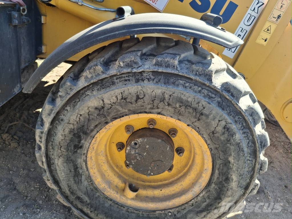 Komatsu WB 93 R-8 لوادر ذات جرافات عكسية