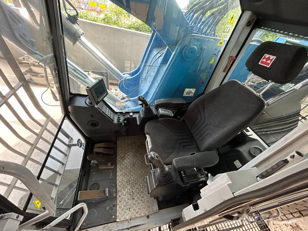 Fuchs MHL 385 مناولات المخلفات / مناولات صناعية