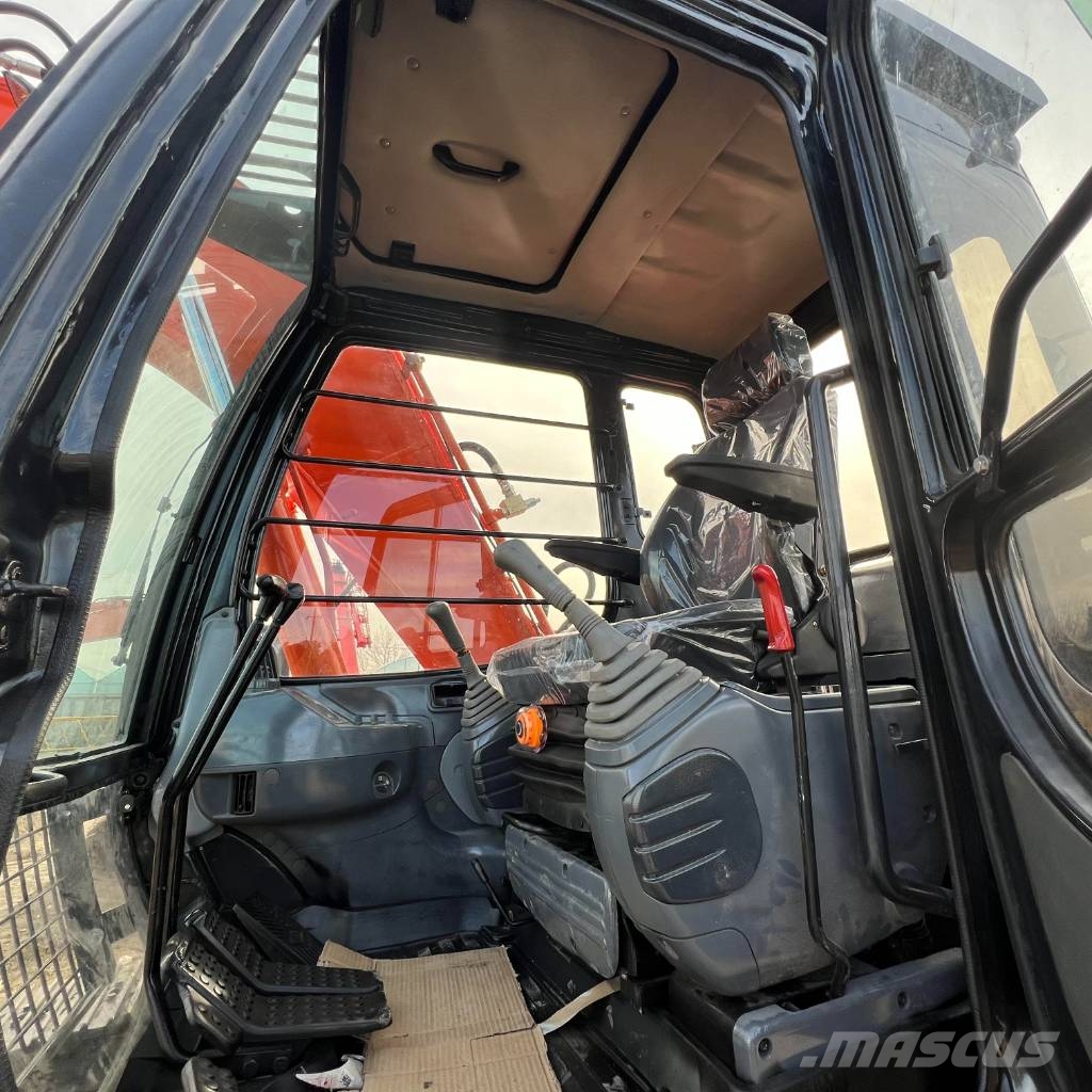 Hitachi EX 120 Гусеничні екскаватори