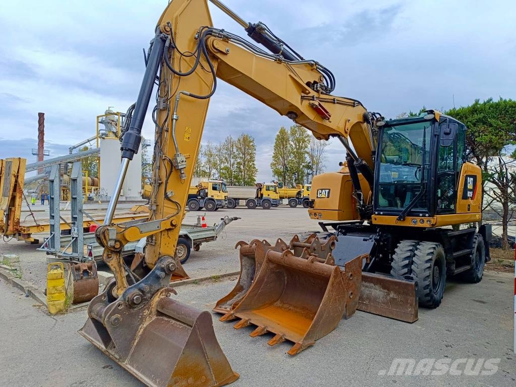 CAT 315 Pelle sur pneus