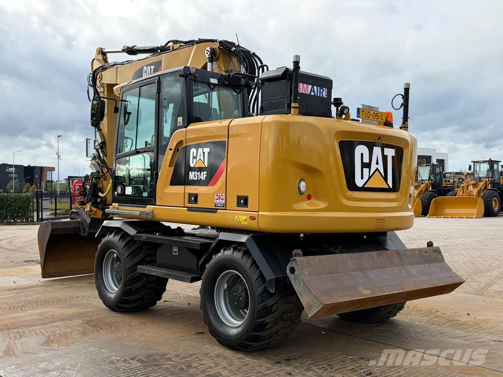 CAT M314F حفارات بعجل