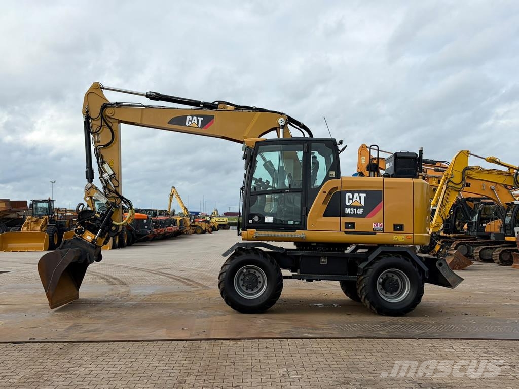 CAT M314F حفارات بعجل