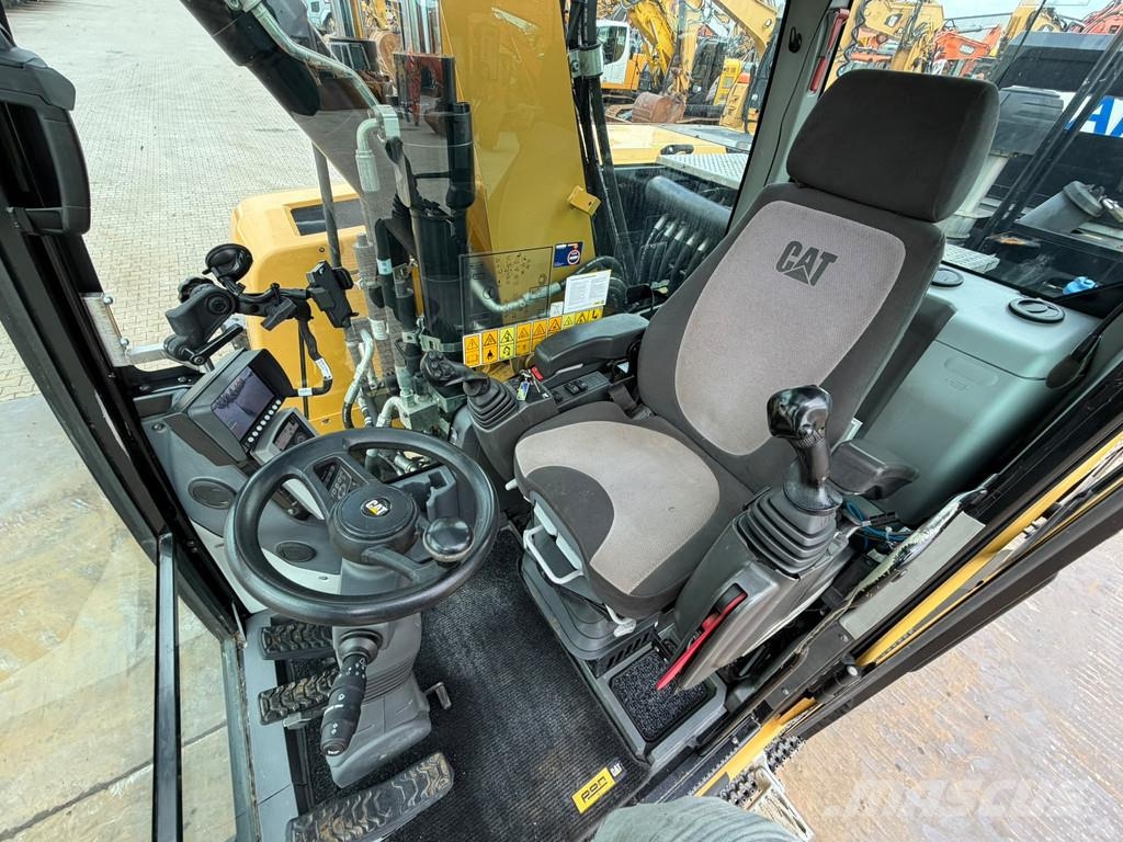 CAT M314F حفارات بعجل