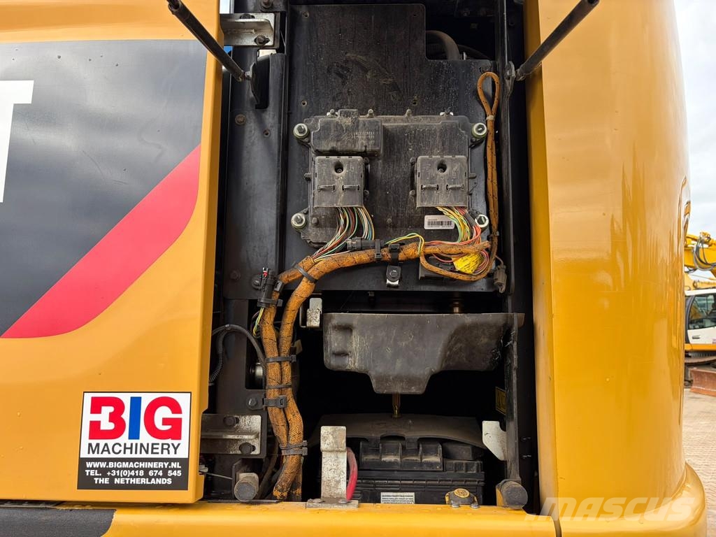 CAT M314F حفارات بعجل