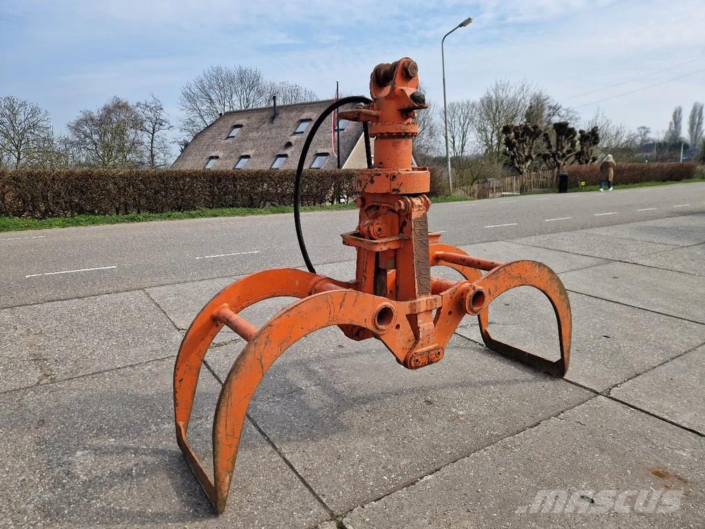 Atlas en O&K hydraulische bomenklemmen ملزمات بكرة