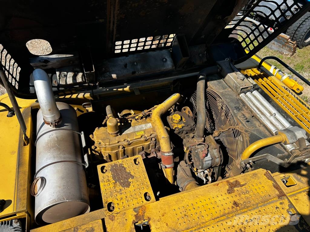 CAT M 325 D L MH مناولات المخلفات / مناولات صناعية