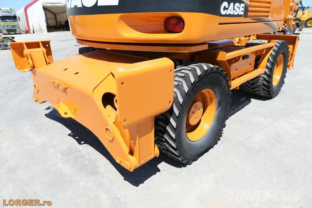 CASE WX 145 حفارات بعجل