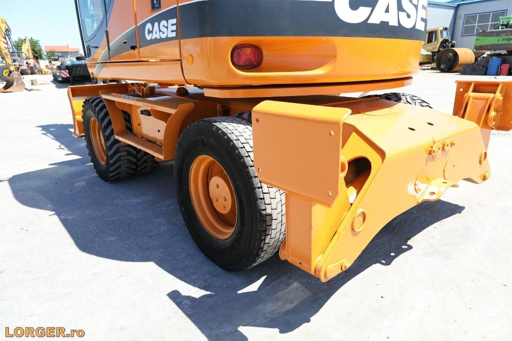 CASE WX 145 حفارات بعجل