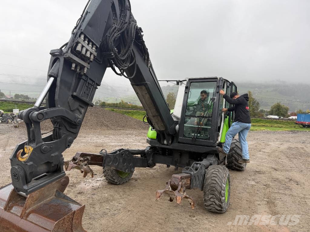 Menzi Muck 525 حفارات بعجل
