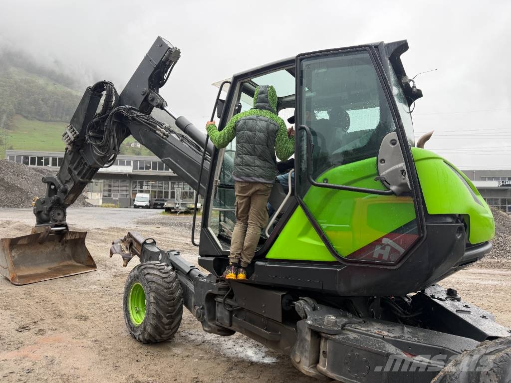 Menzi Muck 525 حفارات بعجل