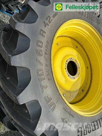 John Deere Hjul par: Trelleborg TM 1060 710/60R42 GKN Gul DW2 الإطارات والعجلات والحافات