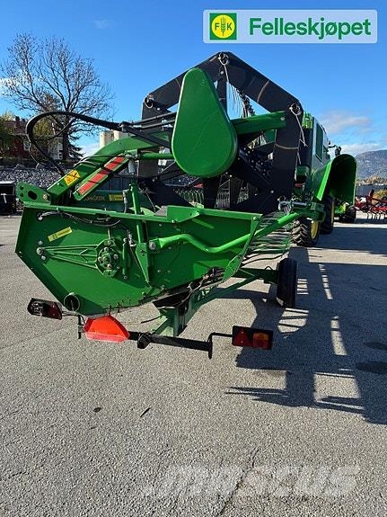 John Deere T560i HM حصادات
