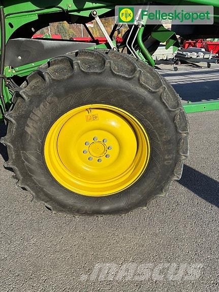 John Deere T560i HM حصادات