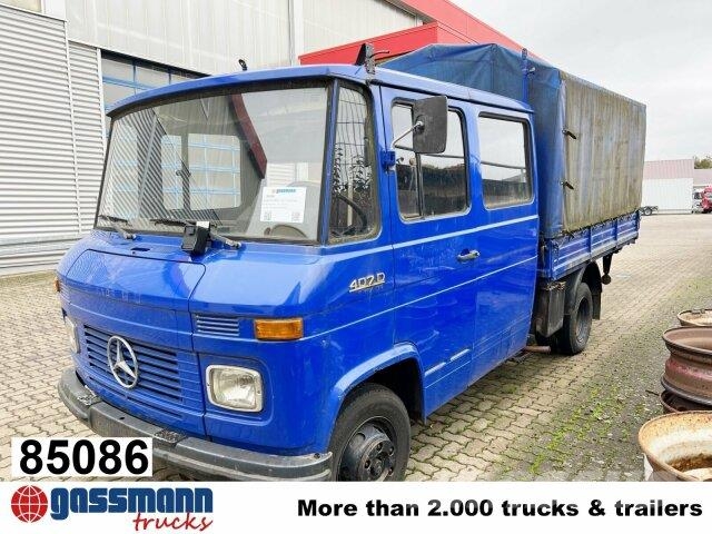Mercedes-Benz L 407 D 4x2 Doka, Ex-THW Pritschenwagen/Pritschenwagen mit Seitenklappe