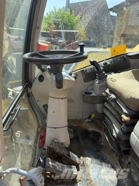 New Holland MH 2.6 Колесни екскаватори