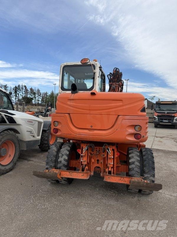 Takeuchi TB295W حفارات بعجل