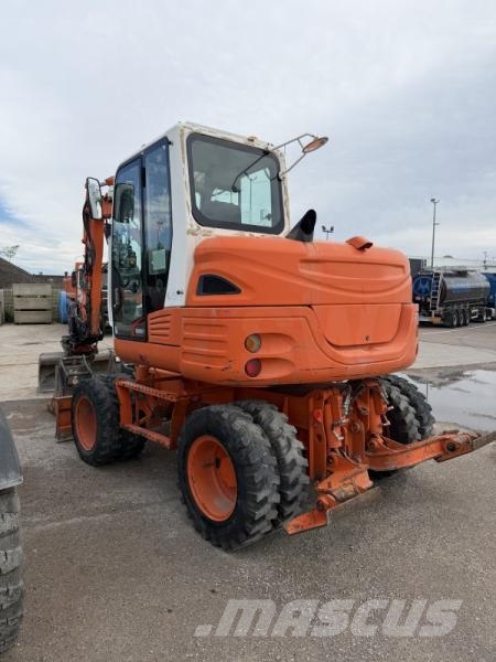 Takeuchi TB295W حفارات بعجل