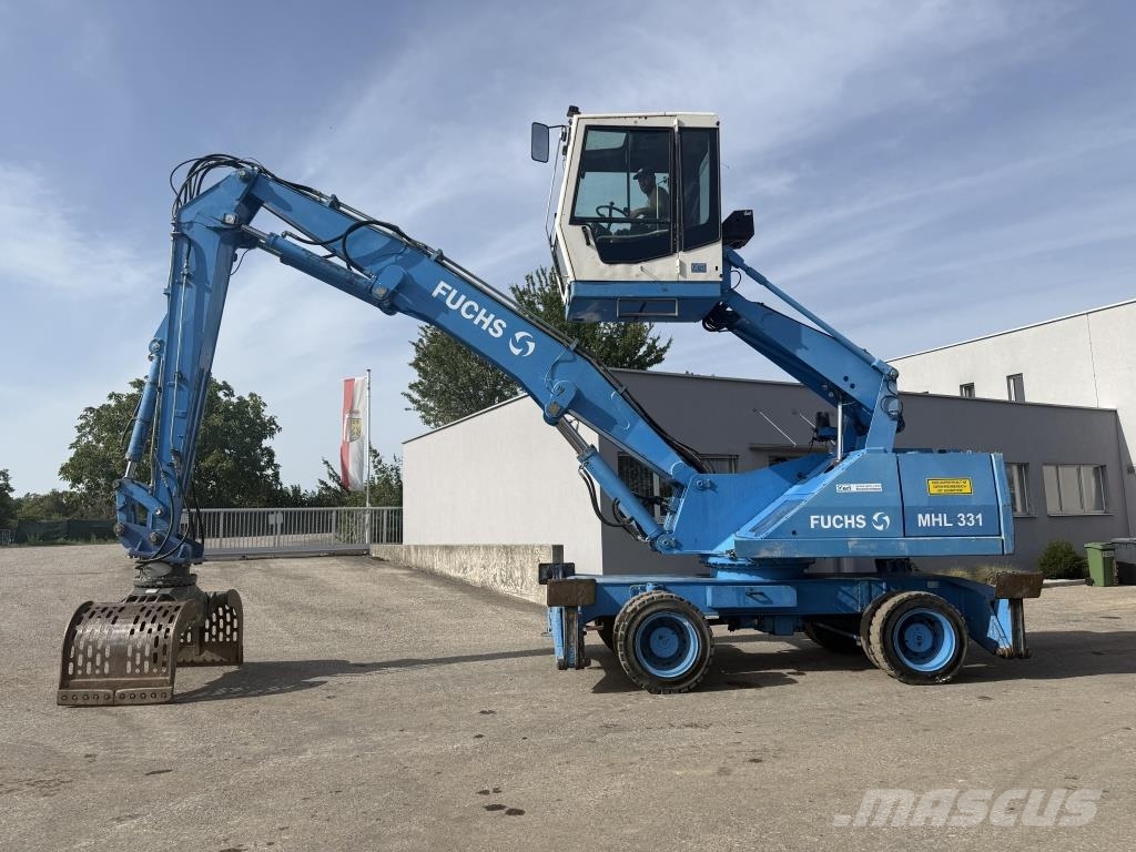 Fuchs MHL 331 Paleta de manipulare
