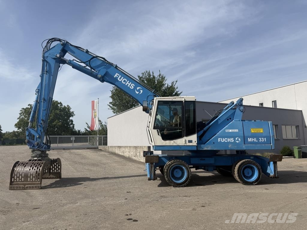 Fuchs MHL 331 Paleta de manipulare