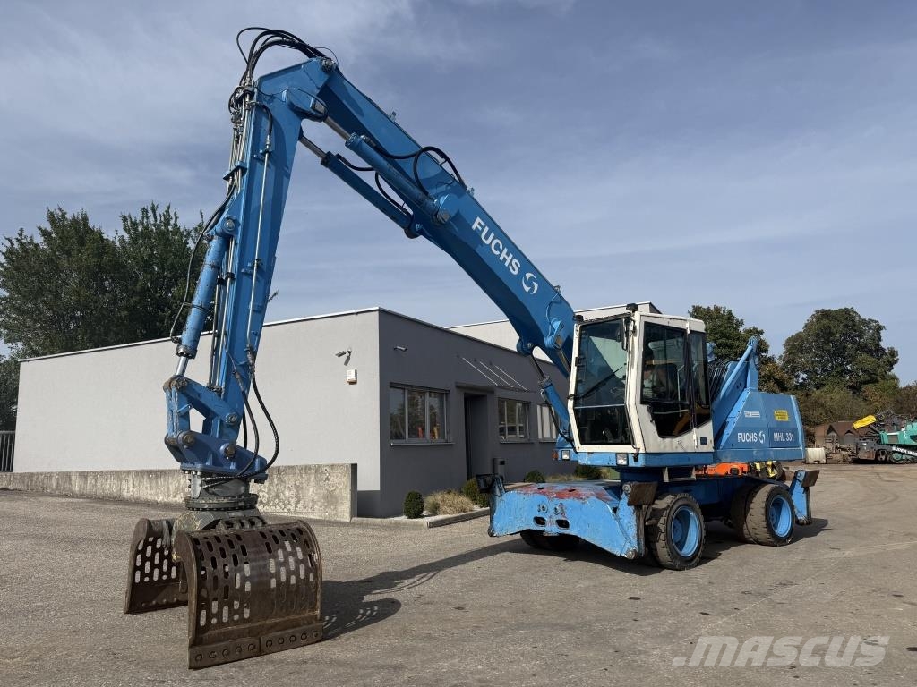 Fuchs MHL 331 Paleta de manipulare