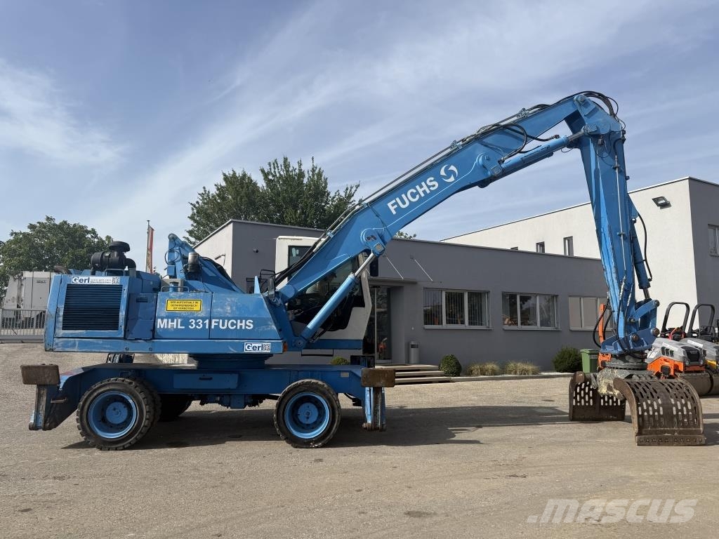 Fuchs MHL 331 Paleta de manipulare