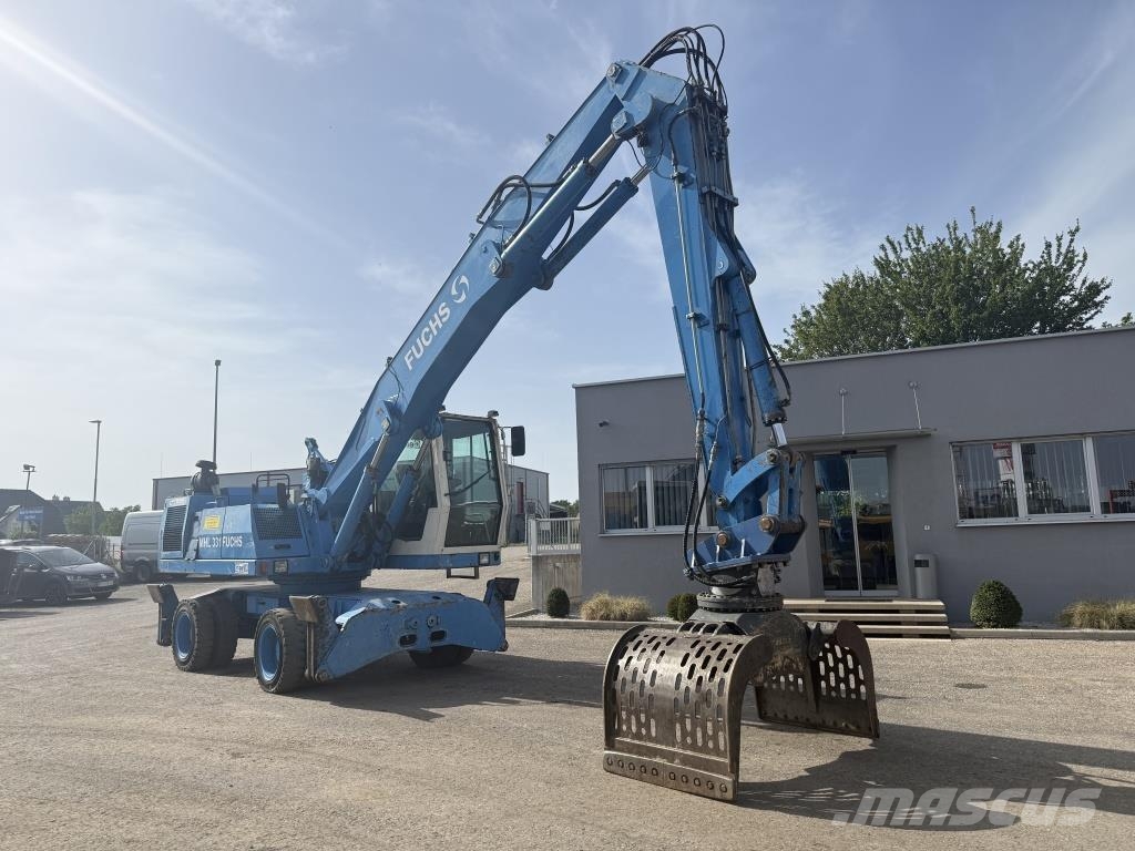 Fuchs MHL 331 Paleta de manipulare