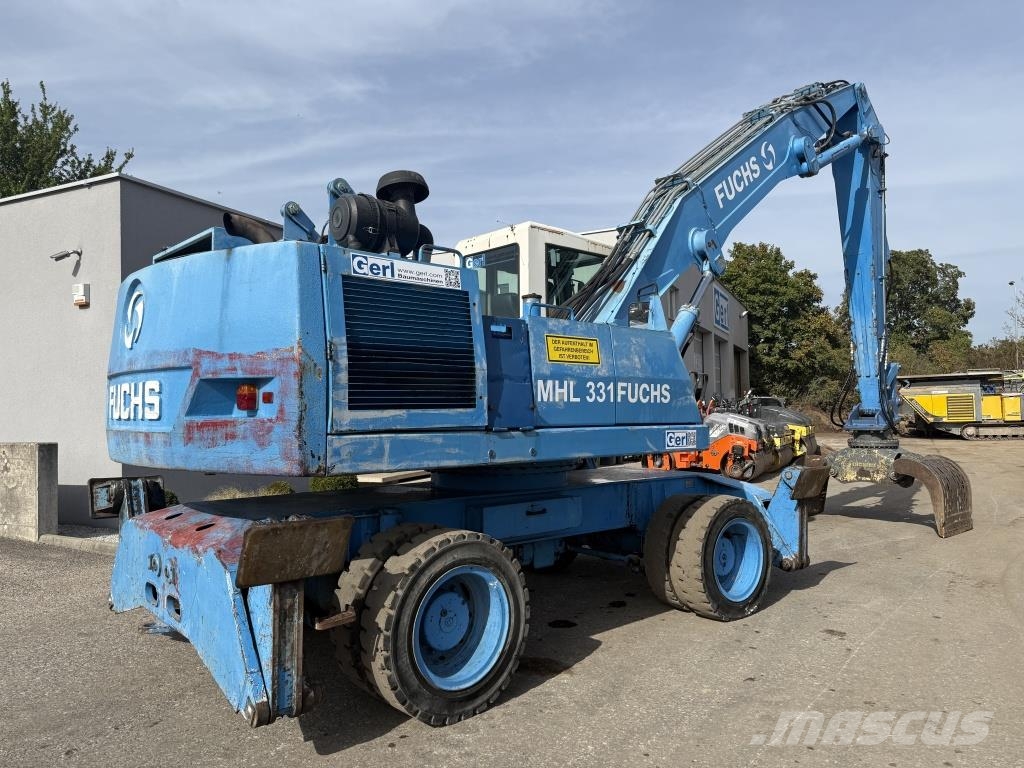 Fuchs MHL 331 Paleta de manipulare