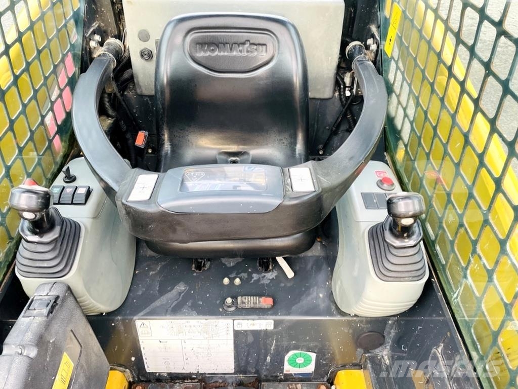 Komatsu SK714 Skid steer loderler