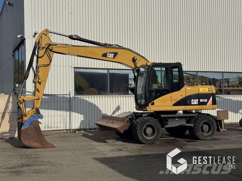 CAT M313D Колесни екскаватори